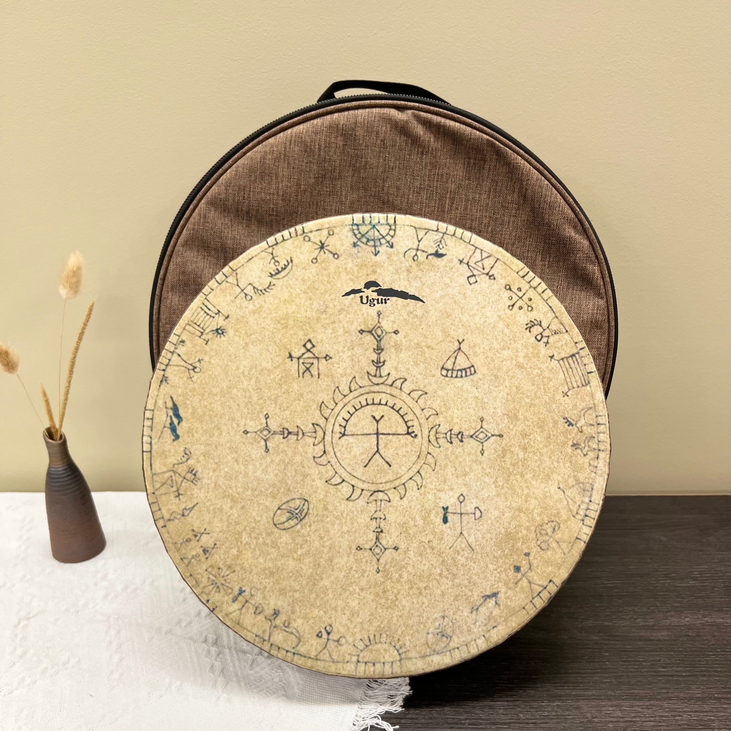 shamanic ocean drum with ancient tribal design for meditation and sound healing.