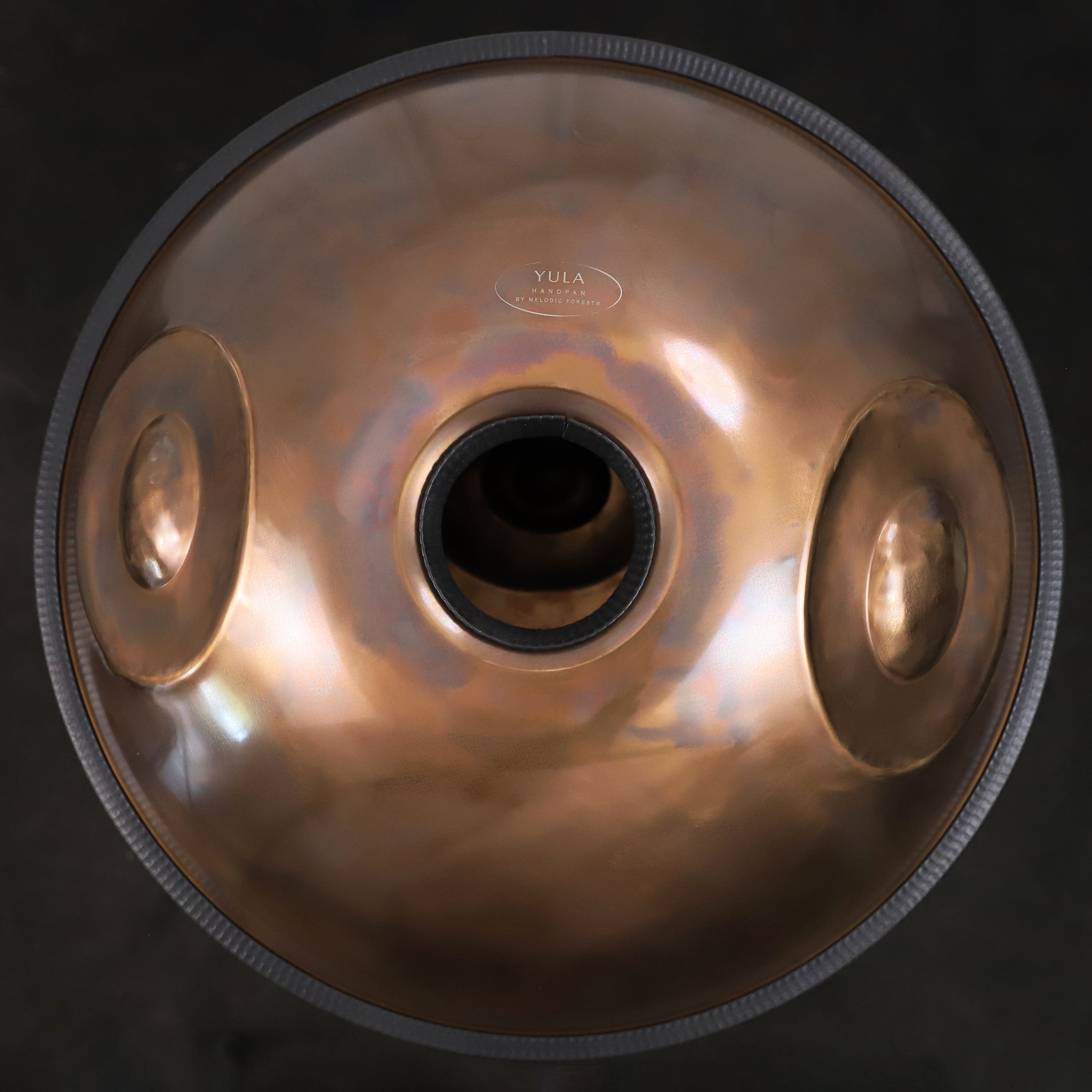 Top view of the YULA Handpan 14-Note F# Pygmy tuned to 432Hz, highlighting its 14-note scale and resonant design.