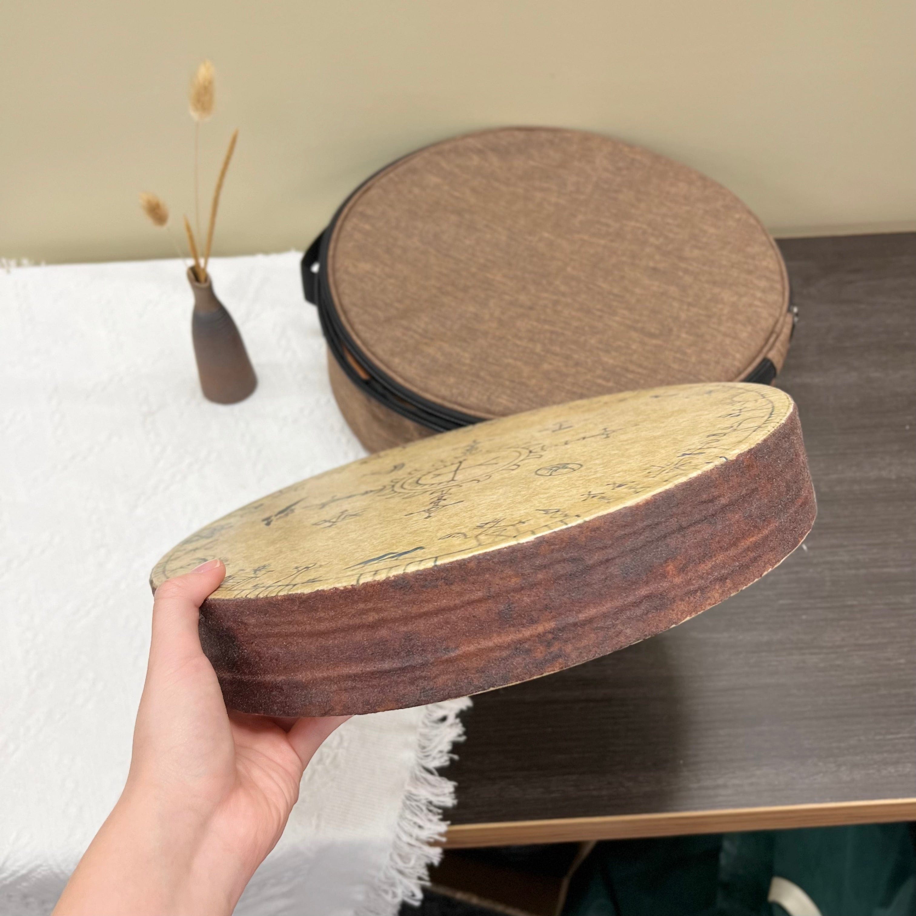 shamanic ocean drum with ancient tribal design for meditation and sound healing.