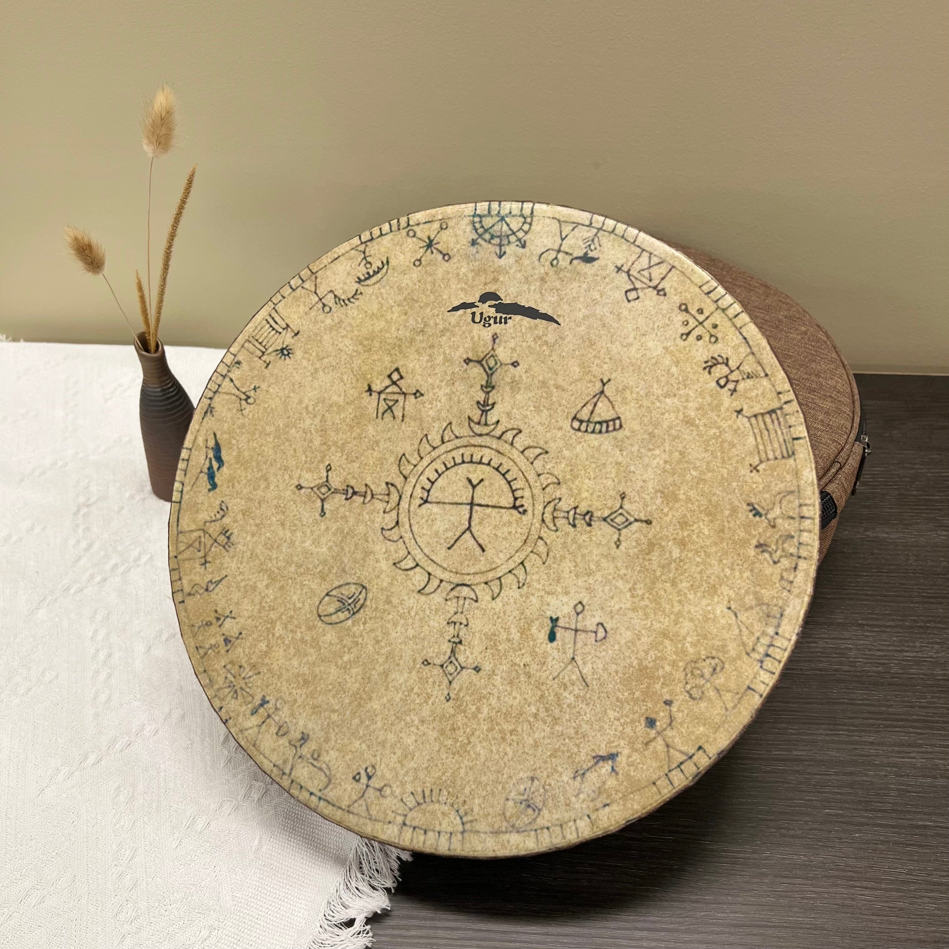 Handcrafted shamanic ocean drum with tribal symbols on natural beige skin and wooden frame.
