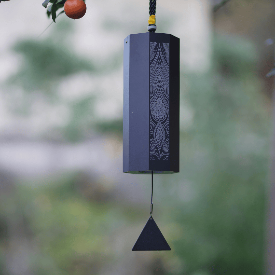 Hluru Octagon Meditation Wind Chime hanging in a peaceful home or yoga space, creating calm ambient sound for relaxation.