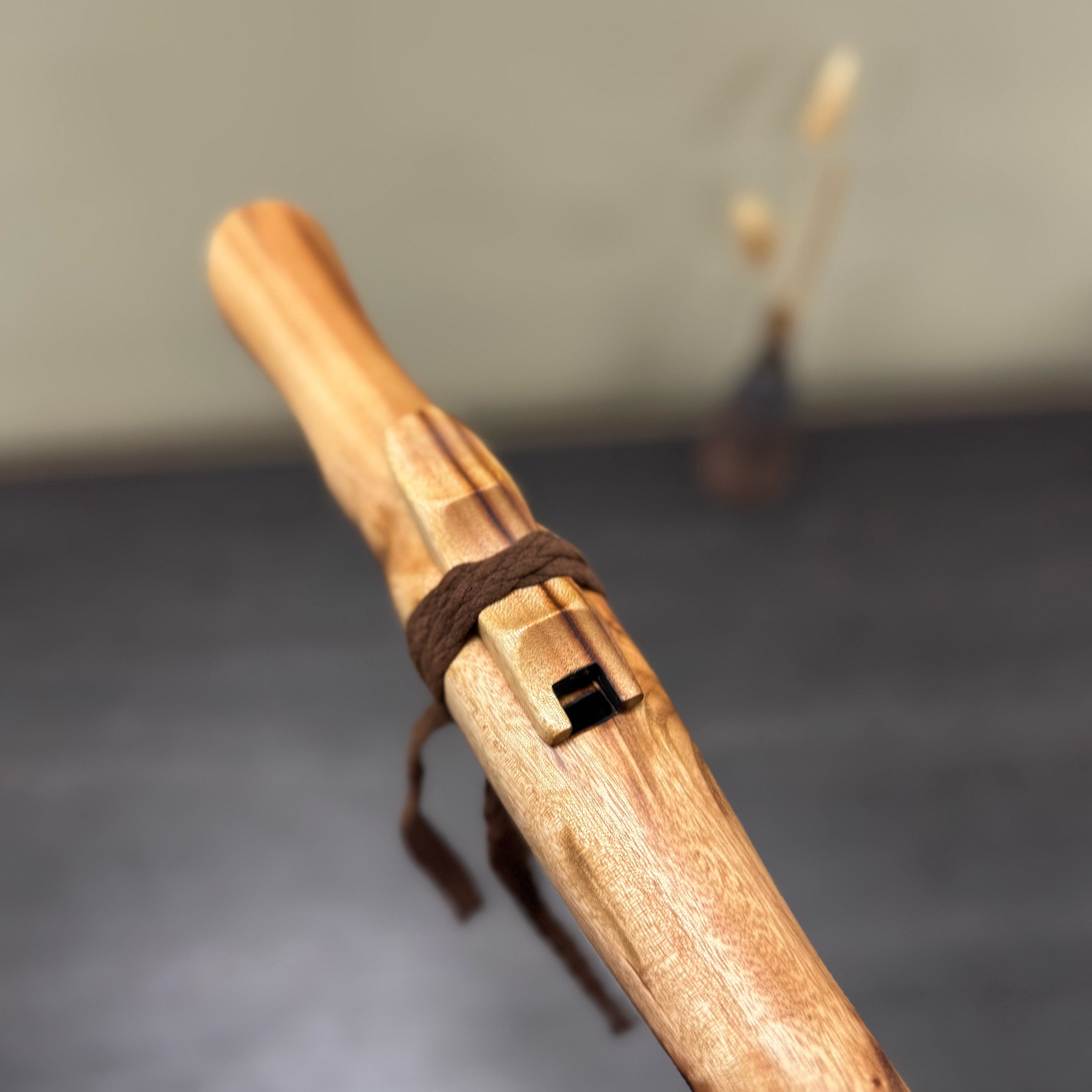 Handmade Australian F# Minor Native Style Flute crafted from Camphor Laurel wood, tuned to 432 Hz with six holes and included colourful handmade bag.