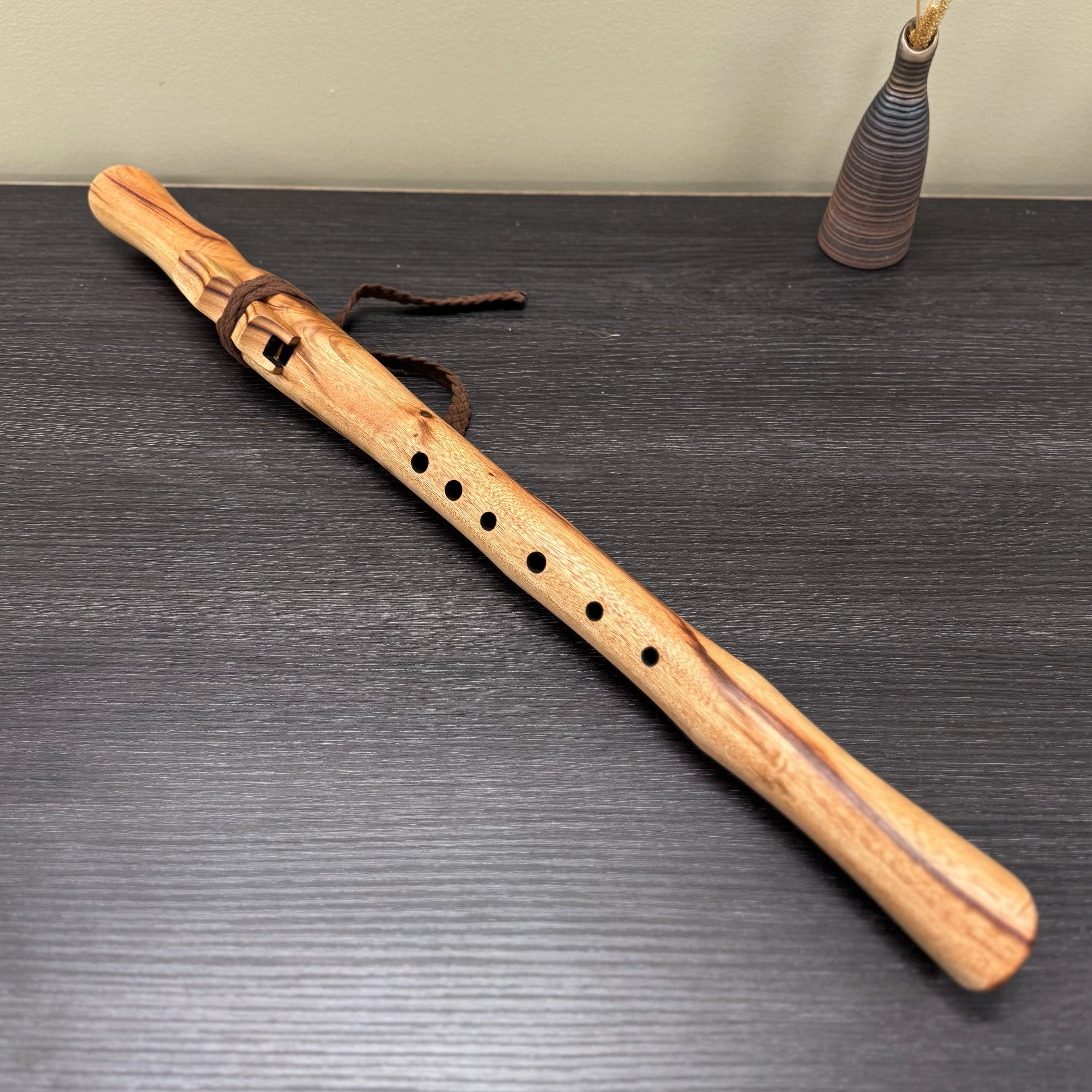 Handmade Australian F# Minor Native Style Flute crafted from Camphor Laurel wood, tuned to 432 Hz with six holes and included colourful handmade bag.