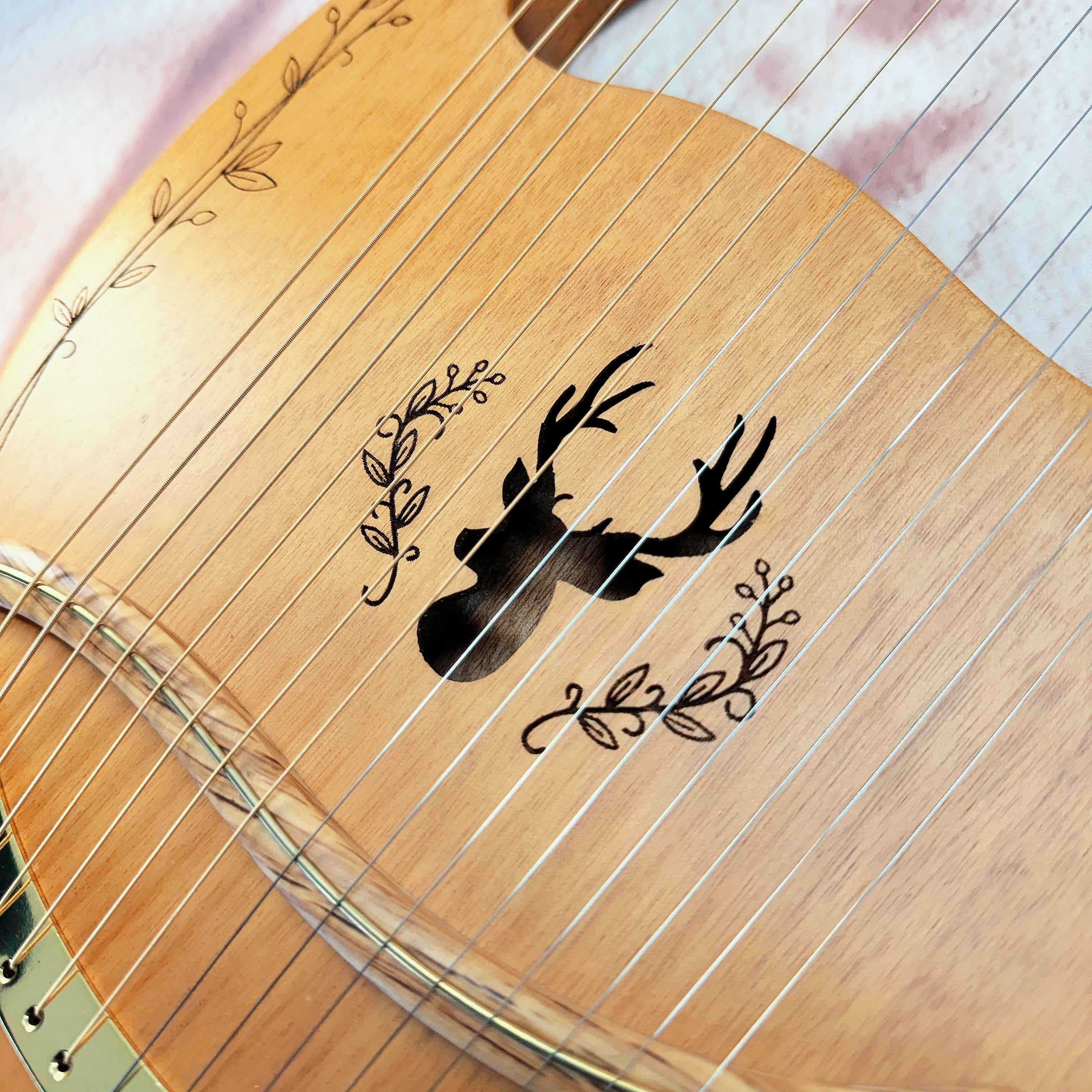 Close-up of NARA Lyre harp strings and tuning pins – handcrafted 16-string instrument for sound therapy and ritual