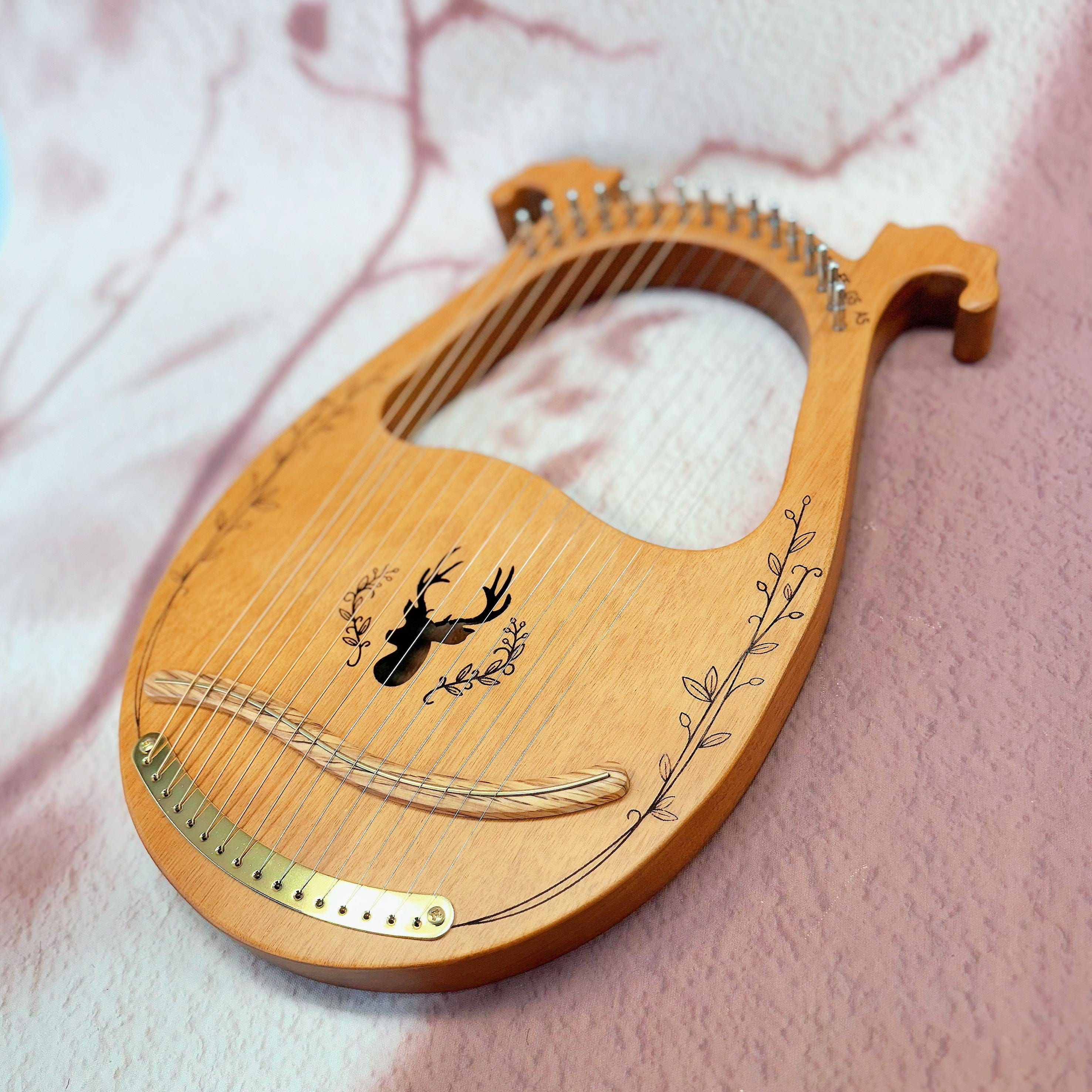 Close-up of NARA Lyre harp strings and tuning pins – handcrafted 16-string instrument for sound therapy and ritual
