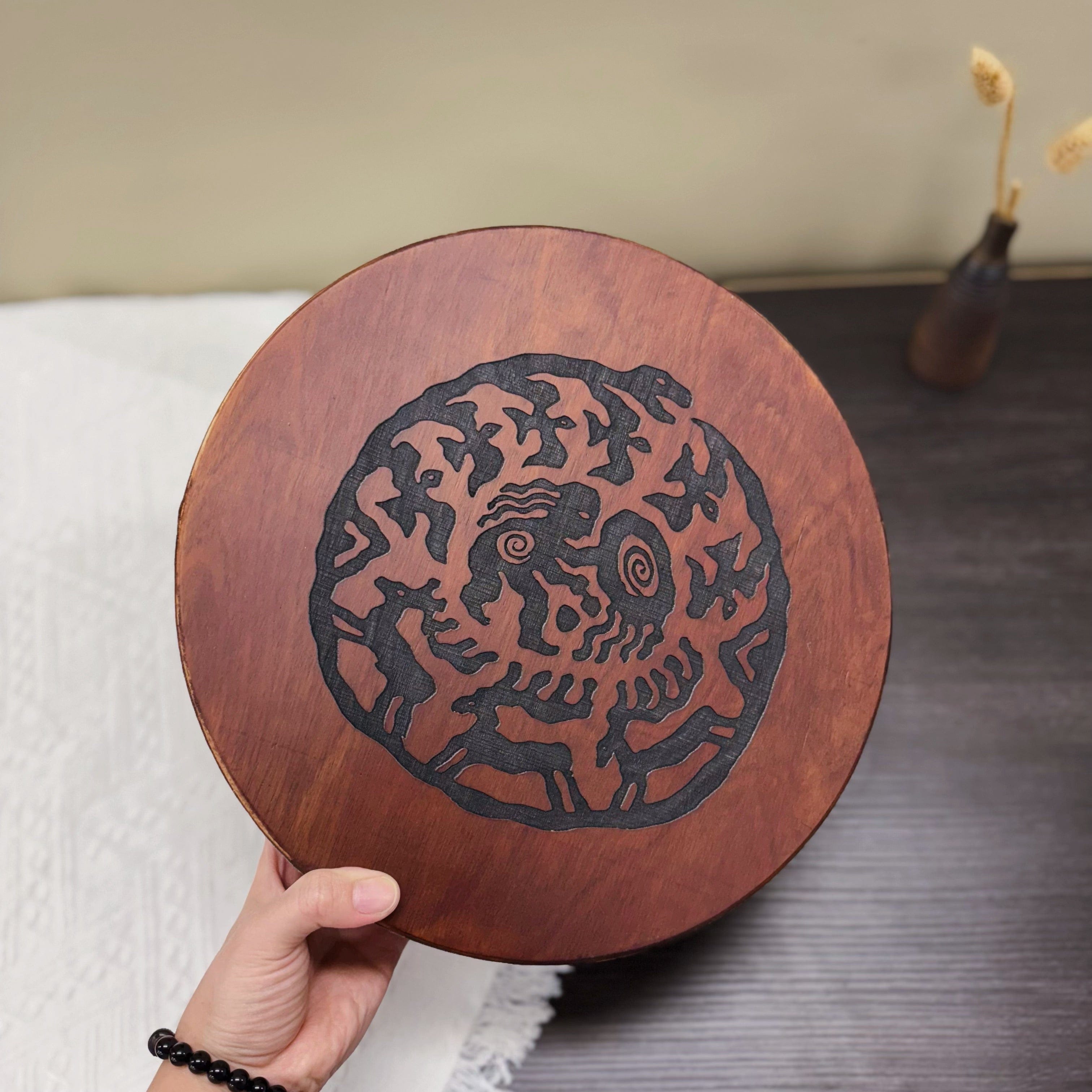 Ugur Water Drum handmade wooden sound healing drum with tribal design, also known as river or ocean drum.