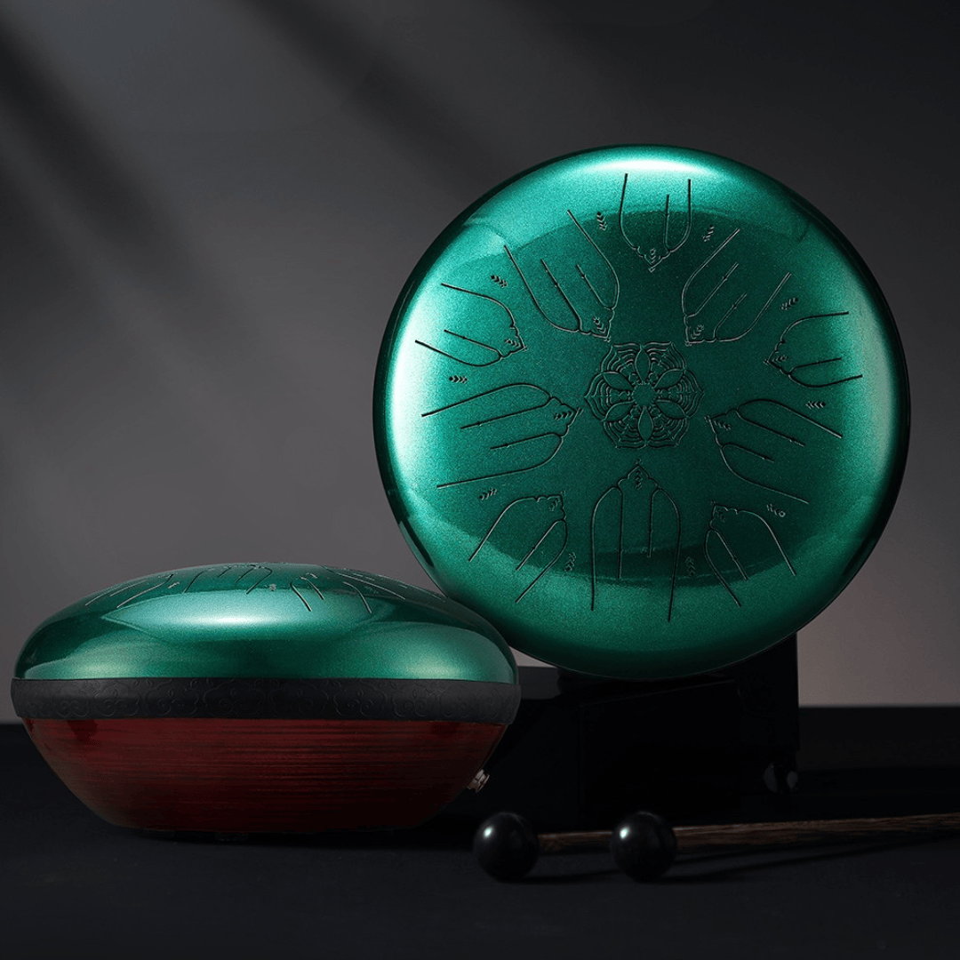 Two Hluru EQ Ethereal Tongue Drums in emerald green displayed with wooden bases and mallets, shown under studio lighting