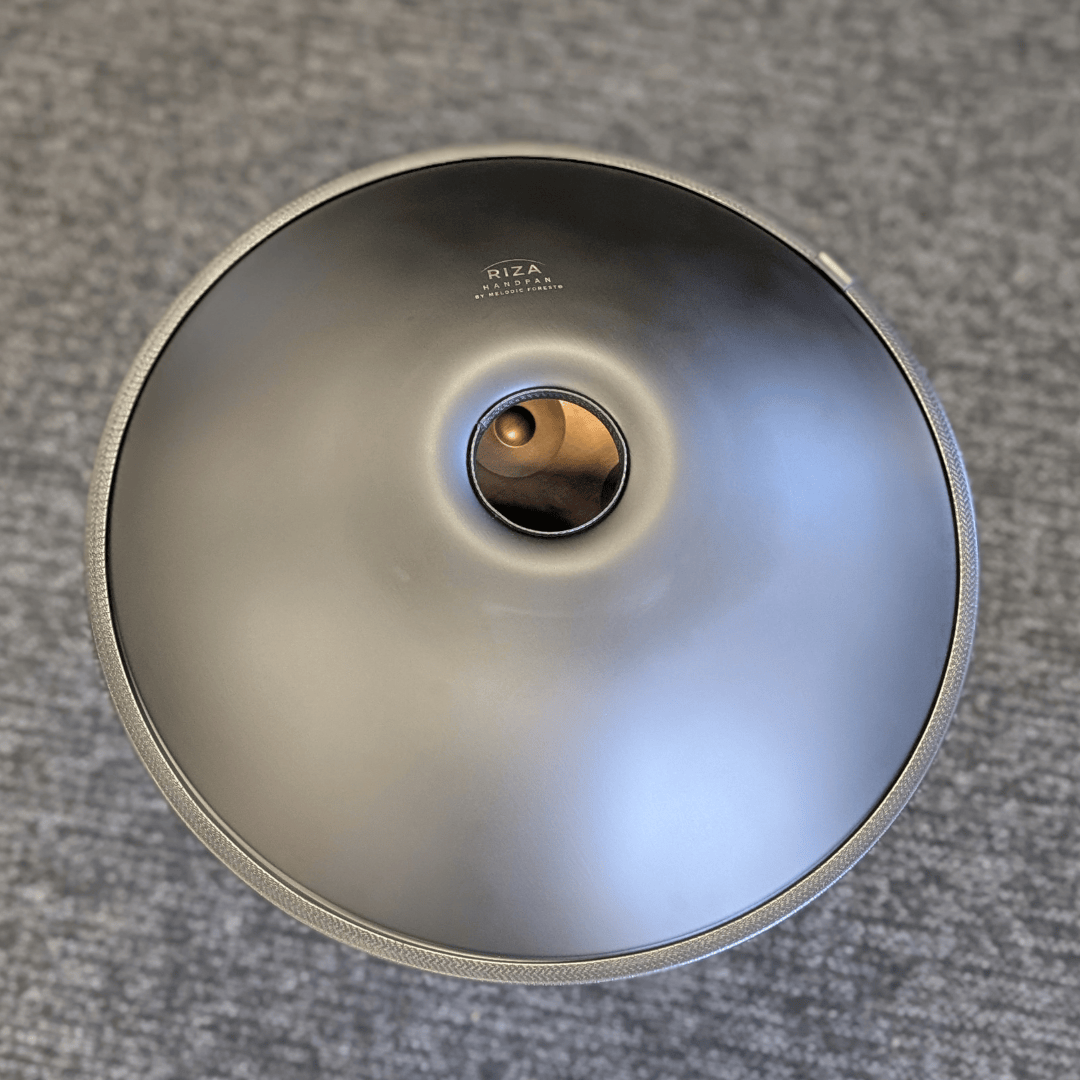 Buy beginner handpan in Australia – 55 cm Mandala Black 10-note D Kurd handpan, 432 Hz tuning, ideal beginner handpan for meditation, music therapy, acoustic performance, and creative expression.
