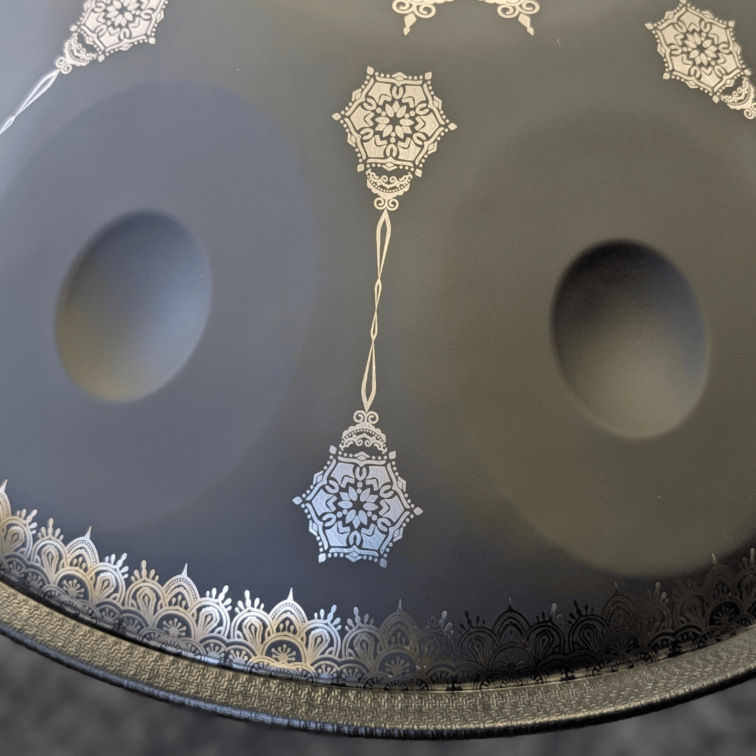 Buy beginner handpan in Australia – 55 cm Mandala Black 10-note D Kurd handpan, 432 Hz tuning, ideal beginner handpan for meditation, music therapy, acoustic performance, and creative expression.
