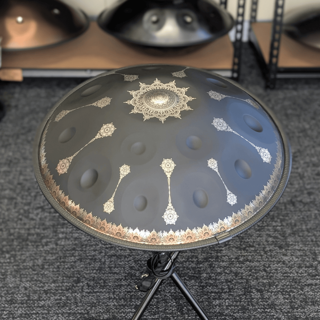 Buy beginner handpan in Australia – 55 cm Mandala Black 10-note D Kurd handpan, 432 Hz tuning, ideal beginner handpan for meditation, music therapy, acoustic performance, and creative expression.
