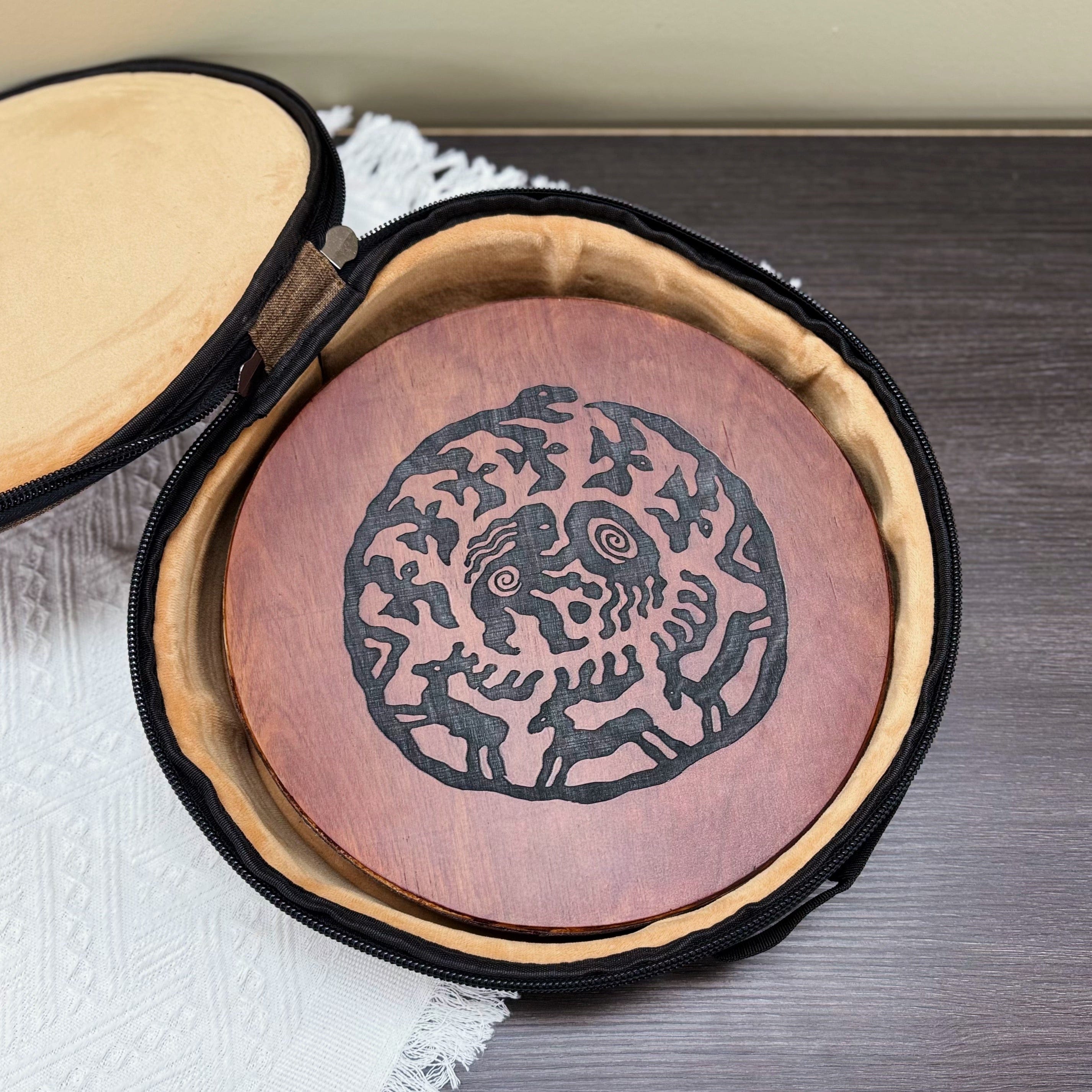 Ugur Water Drum handmade wooden sound healing drum with tribal design, also known as river or ocean drum.