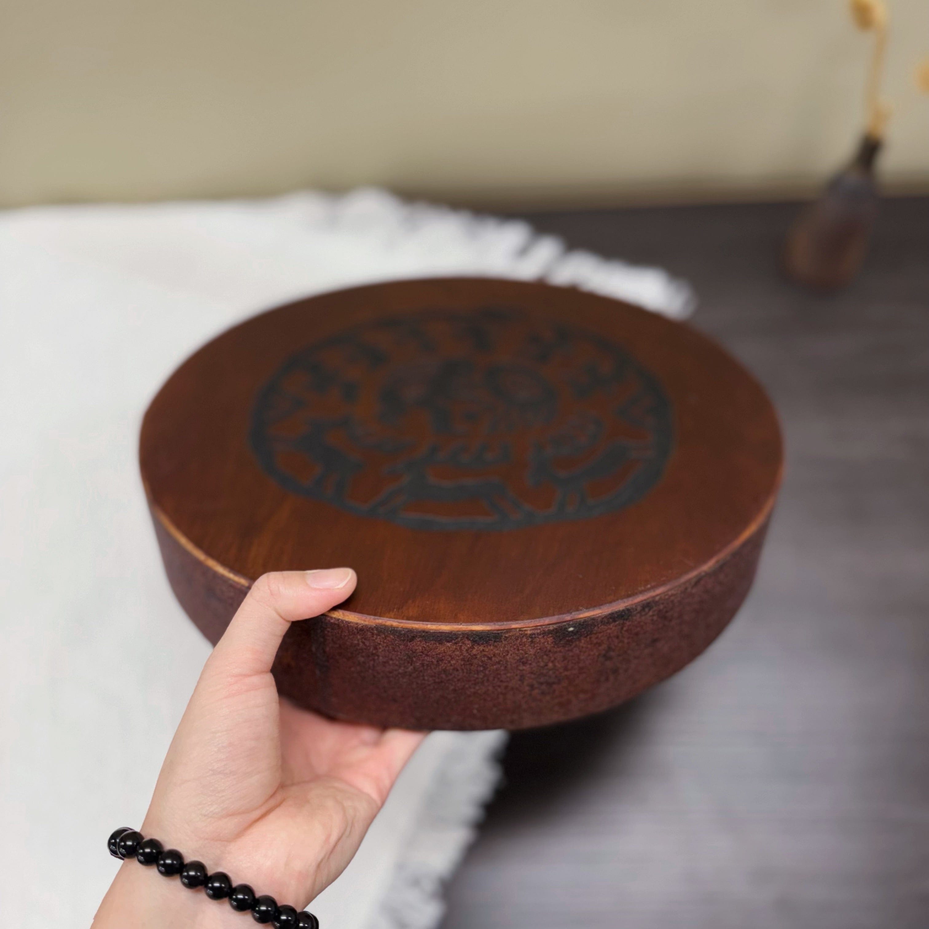 Ugur Water Drum handmade wooden sound healing drum with tribal design, also known as river or ocean drum.