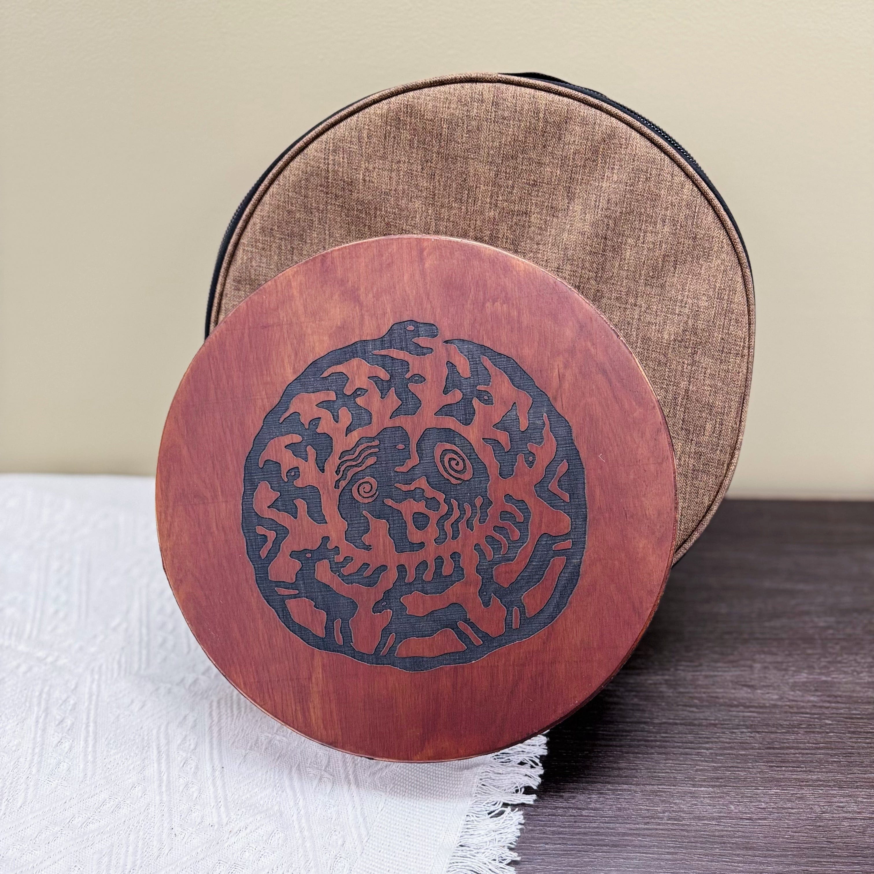 Ugur Water Drum handmade wooden sound healing drum with tribal design, also known as river or ocean drum.