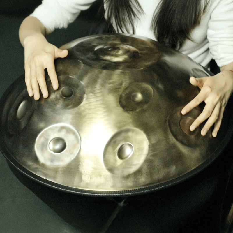 Buy Handpan Australia – YULA 15-Note C# Pygmy double-sided amber steel handpan, Quality Handpan with elegant bronze finish, Affordable Handpan and ideal Handpan for beginners.